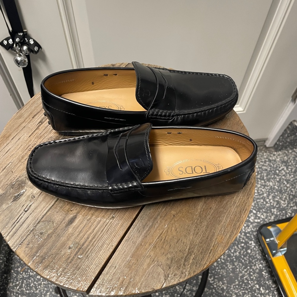 Tod's Black Leather Penny Loafers